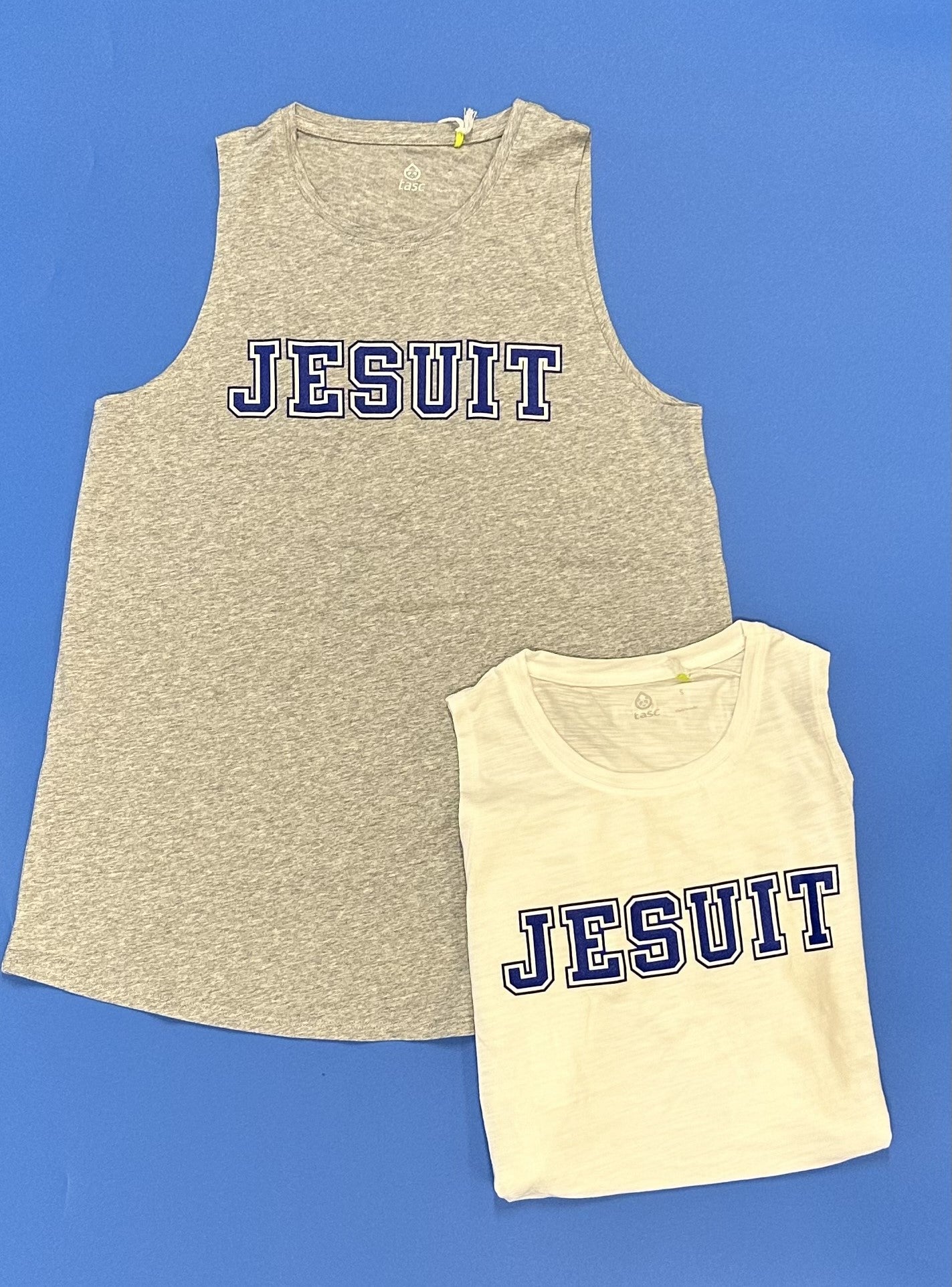 Tasc Performance.  53% Organic Cotton/43% Viscose from Bamboo, 4% Lycra Spandex.  Relaxed, A-line Fit. High crew neckline. Slightly curved bottom hem.True side seam.  Approx. 26.5” body length. Machine Washable/Dryer Safe.  Jesuit logo.