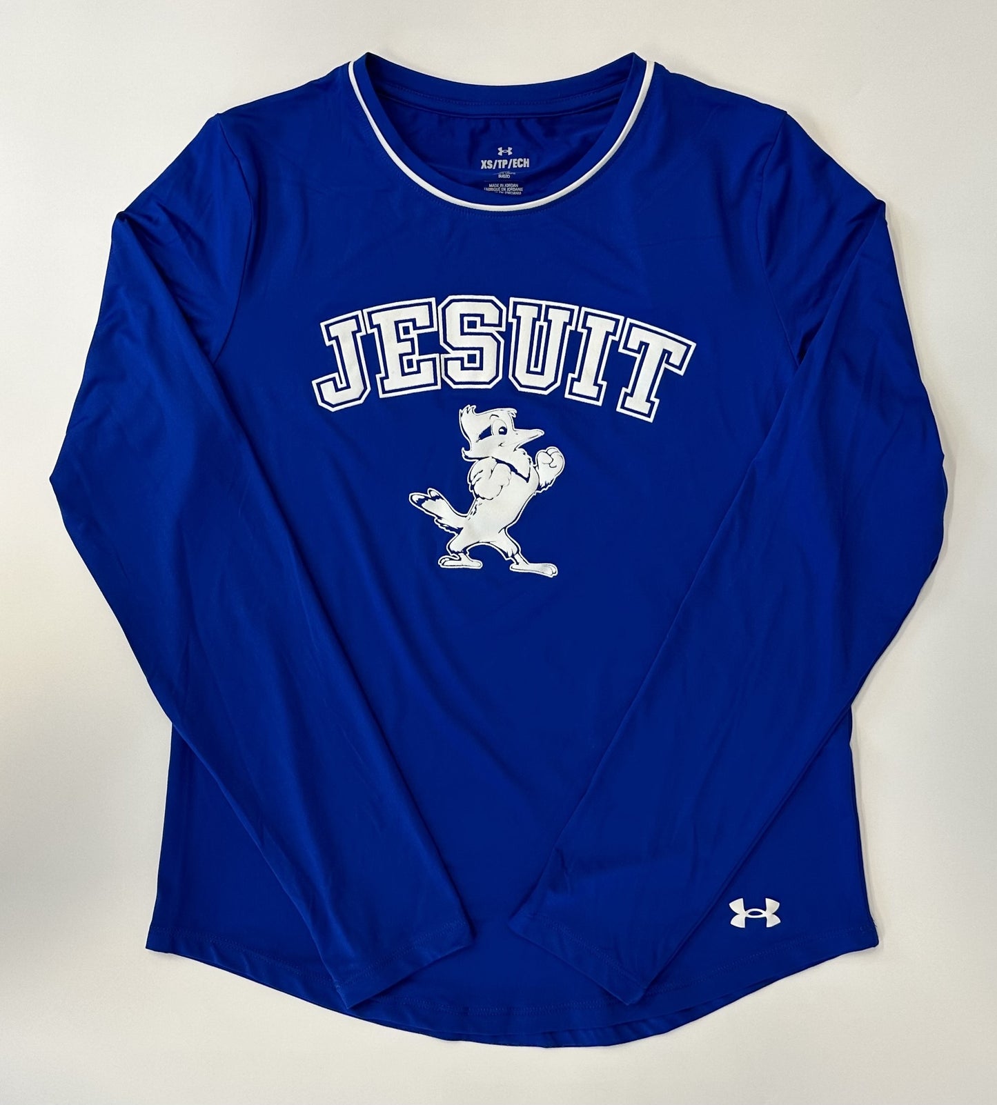 Under Armour.  90% Polyester/10% Elastane.  UA Tech fabric is quick-drying, ultra-soft & has a more natural feel. Set in sleeve construction with 1/8" white pipe detail at neckline. Curved hemline.  JESUIT w/Jayson logo.
