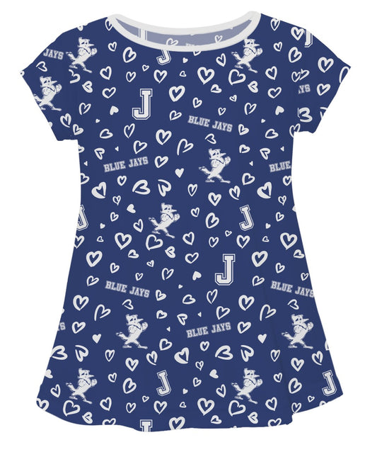 Vive La Fete.&nbsp; 100% Polyester.

Your girl will look stylish in her soft short sleeve scoop neck swing style tunic top. The sublimated performance fabric is moisture wicking and breathable and holds its colors forever. Let her play, go to the game, and cheer loudly and proudly with her Blue Jays gear.
CARE INSTRUCTIONS: Machine wash warm. Tumble dry low or hang dry. Remove promptly. Do not add fabric softeners. Do not iron. Do not bleach. Wash with like colors.
J, Jayson & Blue Jays logos.